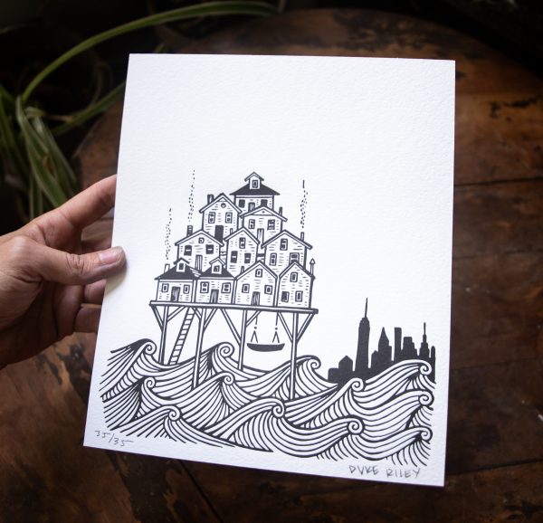 a small letterpress print on white paper depicting a group of bungalows raised on stilts over the ocean, with the NYC skyline in the background